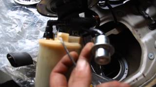 2009 Hyundai Sonata Fuel pump replacement [upl. by Onaicul]