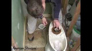 How to Install a Toilet by American Standard [upl. by Nymassej]