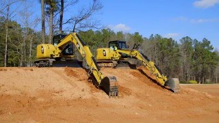 Cat® Mini Excavators  Standard Boom vs Variable Angle Booms [upl. by Yesnik999]