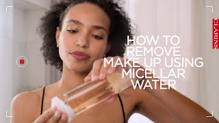 How to remove make up using micellar water  Clarins [upl. by Adnilreb]