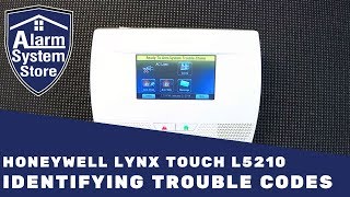 How To Clear Trouble Conditions On Honeywell Lynx L5210  AlarmSystemStore [upl. by Petronilla]