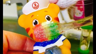 DANIEL TIGER Brushing Teeth with Light Up Life Of Pets Toothbrush [upl. by Aem63]