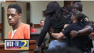 WATCH Murder victims teen daughter lunges at accused killer removed from courtroom  WSBTV [upl. by Fedirko]