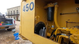 Changing hydraulic oilcleaning suction screen in John Deere 450G [upl. by Emogene]