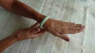 How to Remove a Too Tight Jade Bangle Bracelet [upl. by Anim394]