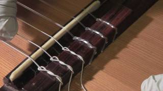 How to restring a classical guitar [upl. by Maroney493]