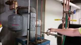 How To Remove Air From Your Heating System [upl. by Agretha]